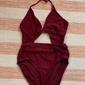 Maroon one piece with cute cutout.